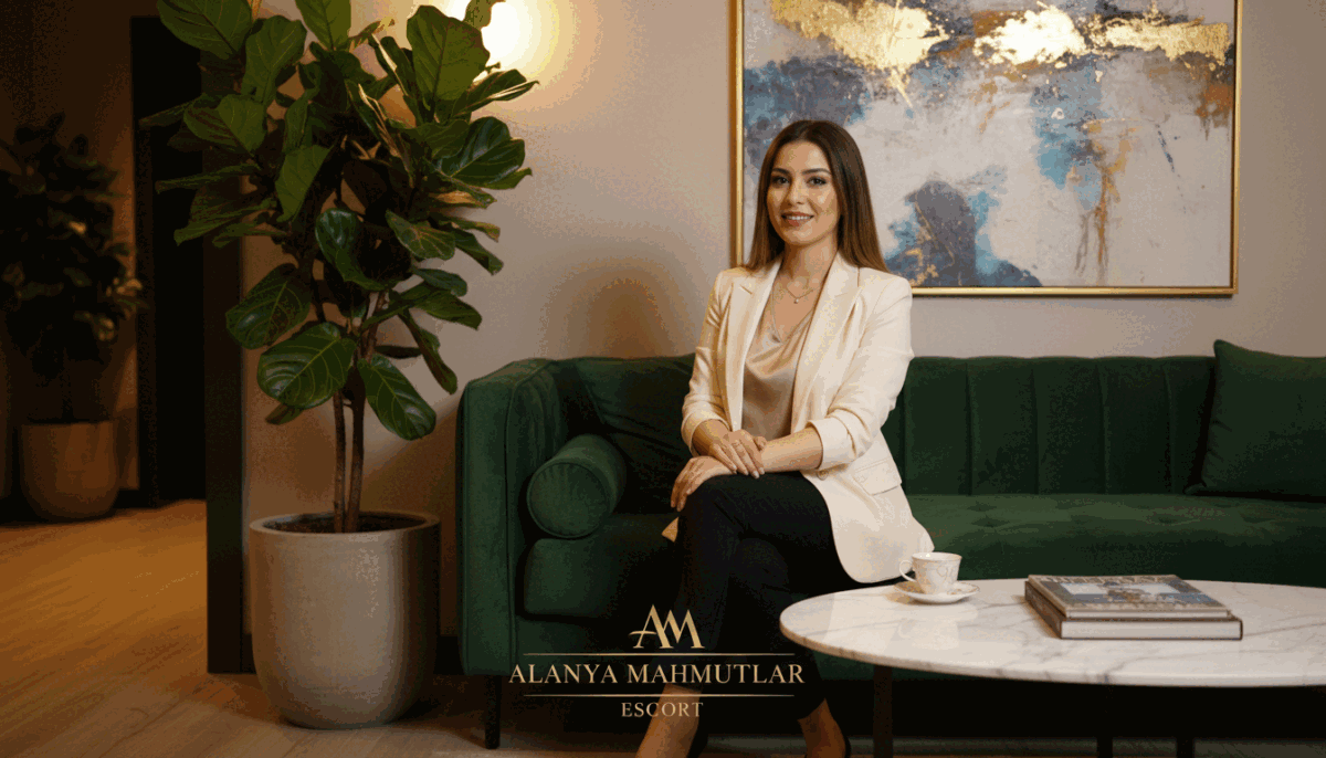 In a luxurious, modern lounge setting in Alanya Mahmutlar, depict a sophisticated, well-dressed woman in professional business attire, exuding confidence and grace. She sits comfortably on an elegant sofa, with a warm and inviting smile, portraying a sense of trust and security. The background features soft, ambient lighting with tasteful decor, including potted plants and abstract artwork, creating a serene atmosphere. Capture the scene from a mid-angle perspective, allowing the viewer to appreciate both the subject and the stylish surroundings. The overall mood is welcoming and refined, emphasizing a safe and comfortable experience associated with the brand "alanya mahmutlar escort." Ensure the image is vibrant and engaging, with a focus on professionalism and elegance. In a luxurious, modern lounge setting in Alanya Mahmutlar, depict a sophisticated, well-dressed woman in professional business attire, exuding confidence and grace. She sits comfortably on an elegant sofa, with a warm and inviting smile, portraying a sense of trust and security. The background features soft, ambient lighting with tasteful decor, including potted plants and abstract artwork, creating a serene atmosphere. Capture the scene from a mid-angle perspective, allowing the viewer to appreciate both the subject and the stylish surroundings. The overall mood is welcoming and refined, emphasizing a safe and comfortable experience associated with the brand "alanya mahmutlar escort." Ensure the image is vibrant and engaging, with a focus on professionalism and elegance.
