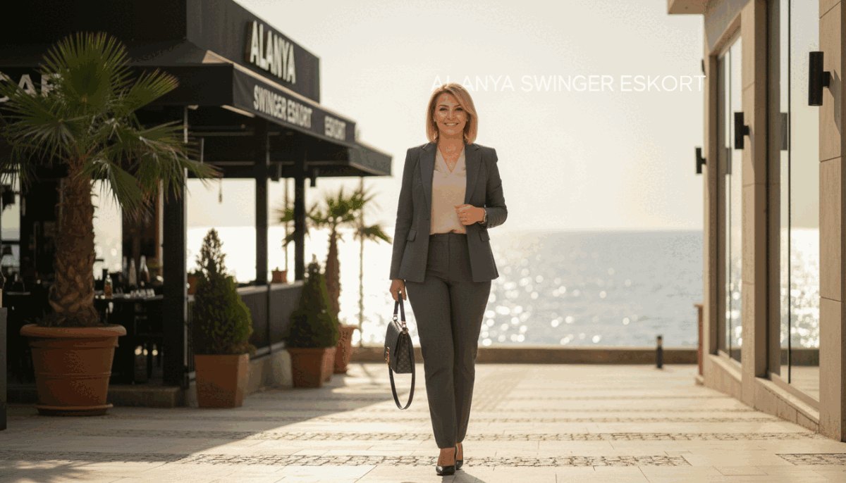 A professional female escort in a sophisticated urban setting, elegantly dressed in a stylish business suit, exuding confidence and poise. In the foreground, she stands with a warm, welcoming smile, her hair neatly styled, reflecting professionalism. The middle layer of the image captures a chic Alanya café backdrop, with subtle hints of palm trees and modern architecture, indicating an upscale environment. The background features a softly blurred ocean view with sunlight glistening on the water, enhancing the relaxed yet luxurious atmosphere. The lighting is bright and natural, suggesting a pleasant day, with a warm color palette that conveys a sense of elegance and charm. The image embodies the high standards of professionalism in the Alanya escort sector, with the branding "alanya swinger eskort" subtly integrated into the scene. A professional female escort in a sophisticated urban setting, elegantly dressed in a stylish business suit, exuding confidence and poise. In the foreground, she stands with a warm, welcoming smile, her hair neatly styled, reflecting professionalism. The middle layer of the image captures a chic Alanya café backdrop, with subtle hints of palm trees and modern architecture, indicating an upscale environment. The background features a softly blurred ocean view with sunlight glistening on the water, enhancing the relaxed yet luxurious atmosphere. The lighting is bright and natural, suggesting a pleasant day, with a warm color palette that conveys a sense of elegance and charm. The image embodies the high standards of professionalism in the Alanya escort sector, with the branding "alanya swinger eskort" subtly integrated into the scene.